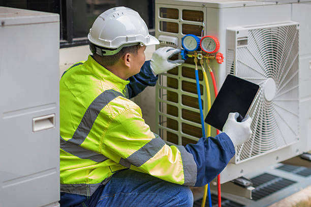 Professional Hvac technician working in Isanti, MN